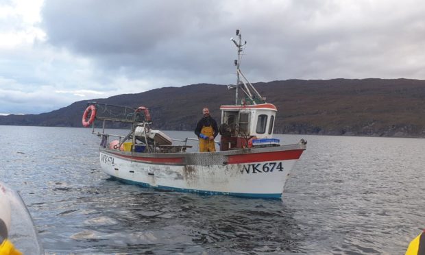 The vessels occupant set off the flare due to poor VHF signal at Loch Kishorn