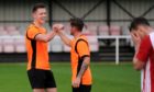 Ali Sutherland (right) celebrates netting for Rothes.