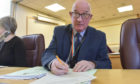 Councillor Derek Ross felt the Springfield Road fence could reduce crime rather than increase it. Image: Jason Hedges/DC Thomson