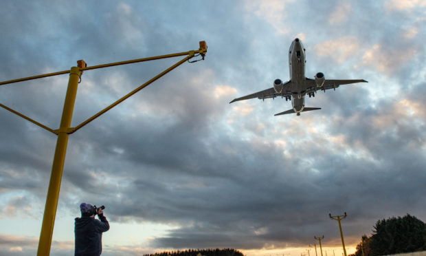 P-8A Poseidon Terence Bulloch arrives at RAF Lossiemouth. Picture by Jason Hedges.