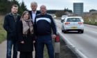 Stephen Smith, Lisa Buchan, Alan Fakley and Bruce Buchan, all of the Dual Peterhead group, on the A90 as it comes into Peterhead. 
Picture by Kenny Elrick.