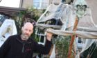 Aboyne joiner Eddie Coutts has made a spooky halloween display for the kids in Abyone for the past 8 years, this year it's drive-by only. 

Picture by Paul Glendell.