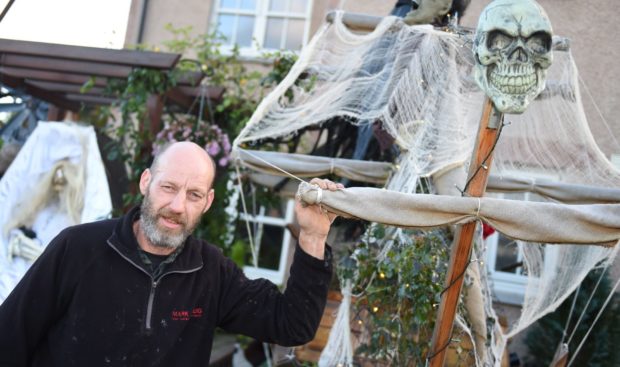 Aboyne joiner Eddie Coutts has made a spooky halloween display for the kids in Abyone for the past 8 years, this year it's drive-by only. 

Picture by Paul Glendell.