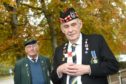 Picture by SANDY McCOOK   29th October '20
Formr Gordon Highlander Gordon MacMillan who is next Friday is going to walk from the Cameron Barracks in Inverness to the Inverness War memorial at Cavell Gardens in full NBC suit including a gas mask
alongside Chad Fraser Hall, formerly of the Royal Greenjackets in aid of the Poppy Appeal.