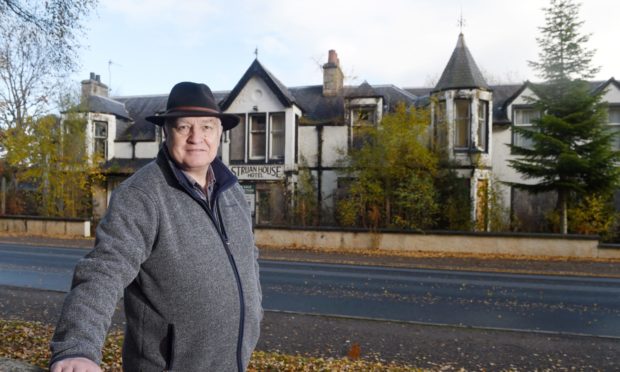 Councillor Bill Lobban outside the former Struan House Hotel in Carrbridge