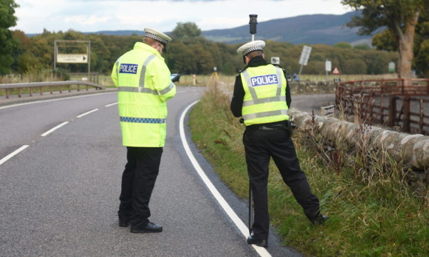 Police at the scene on the A82 near Urquhart Castle