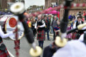 Turriff and District Pipe Band plays at a previous town centre engagement.