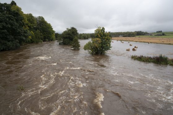 The River Don bursts its banks at Bridge of Alford, following heavy rain. 

Picture by Julia Sidell 04/10/2020