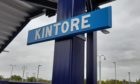The original Kintore Railway Station sign, refurbished and installed at the brand new station.