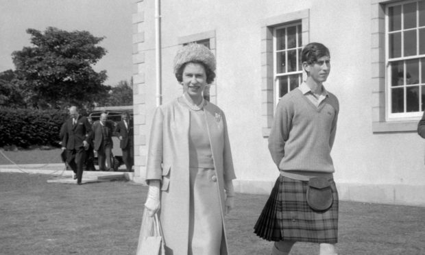 Queen Elizabeth II, at Gordonstoun School with Prince Charles