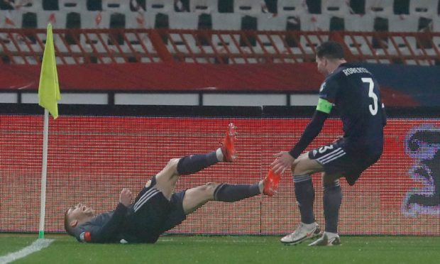 Ryan Christie celebrates with Andy Robertson after putting Scotland in front.