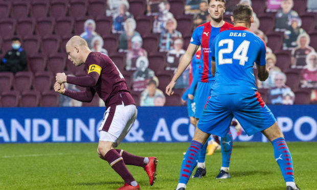 Steven Naismith celebrates netting for Hearts.