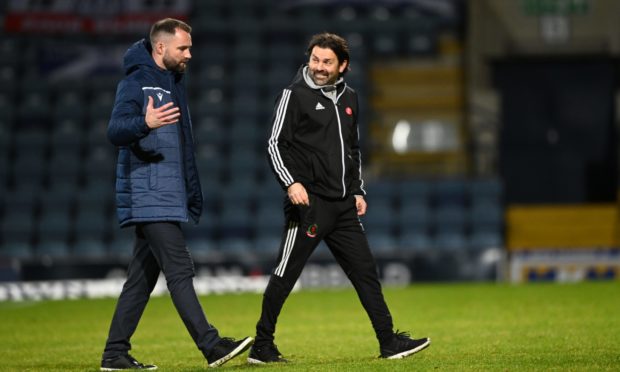 Paul Hartley with Dundee manager James McPake.