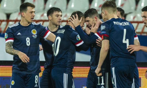 Ryan Christie celebrates his goal for Scotland in Serbia.