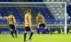 Inverness keeper Cameron Mackay saves a penalty from East Fife's Jack Hamilton.