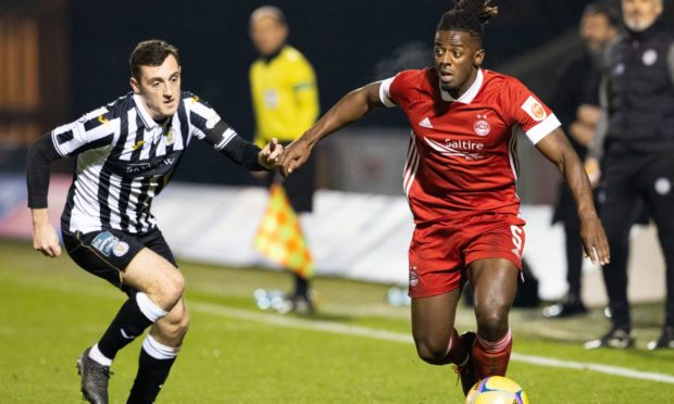 Aberdeen's Greg Leigh (R) in action.