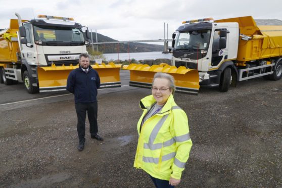 Councillor Trish Robertson checking out delivery of 10 new snow ploughs.