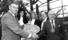 Holywood legend Charlton Heston congratulates Aberdeen Lord Provost Henry Rae on the city's success as national winner in the Beautiful Britain in Bloom competition. The actor was performing in A Man For All Seasons at HMT.