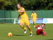 Forres' Simon Allan breaks away from the Formartine defence in the second half at North Lodge Park.