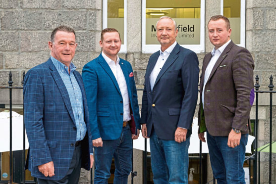 L-R: David Rennie, who has been appointed legal counsel for Mansefield Investments, alongside Harry, Mark and Philip Patterson.