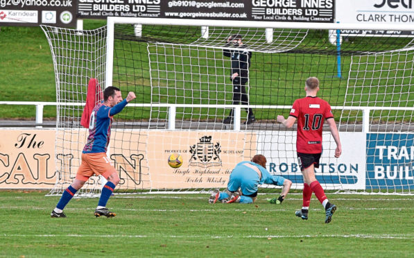 Darren Lyon scores and team-mate David Galt celebrates.
Picture by Jason Hedges