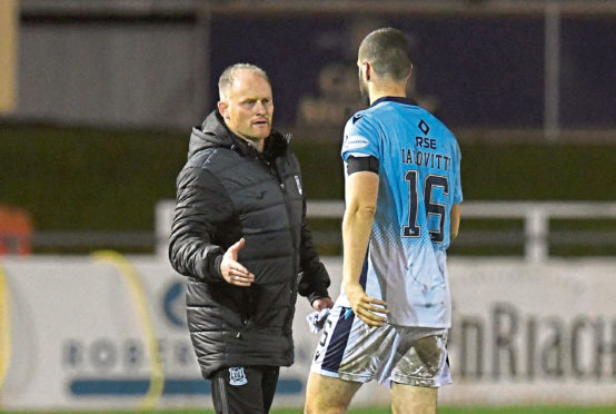 Elgin boss Gavin Price and Ross County defender Alex Iacovitti following a League Cup tie last season.