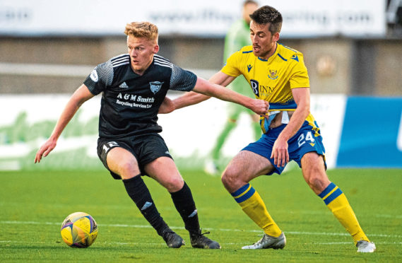 Peterhead's Andy McCarthy, left, in action against St Johnstone.