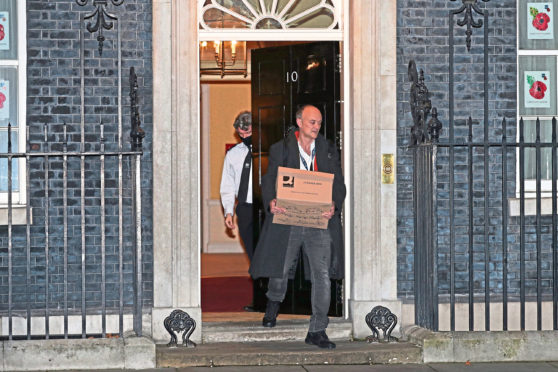 Prime Minister Boris Johnson's top aide Dominic Cummings leaves 10 Downing Street, London, with a box.