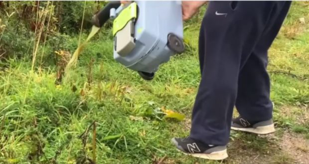 NC500 road tripper emptying motorhome toilet waste in a far north layby, part of a video documenting his group's road trip.