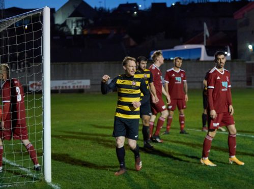 Ally Macdonald celebrates scoring Brora's third goal in their victory over Deveronvale