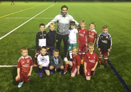 Graeme Shinnie returns to Dyce Boys Club where he started playing football.