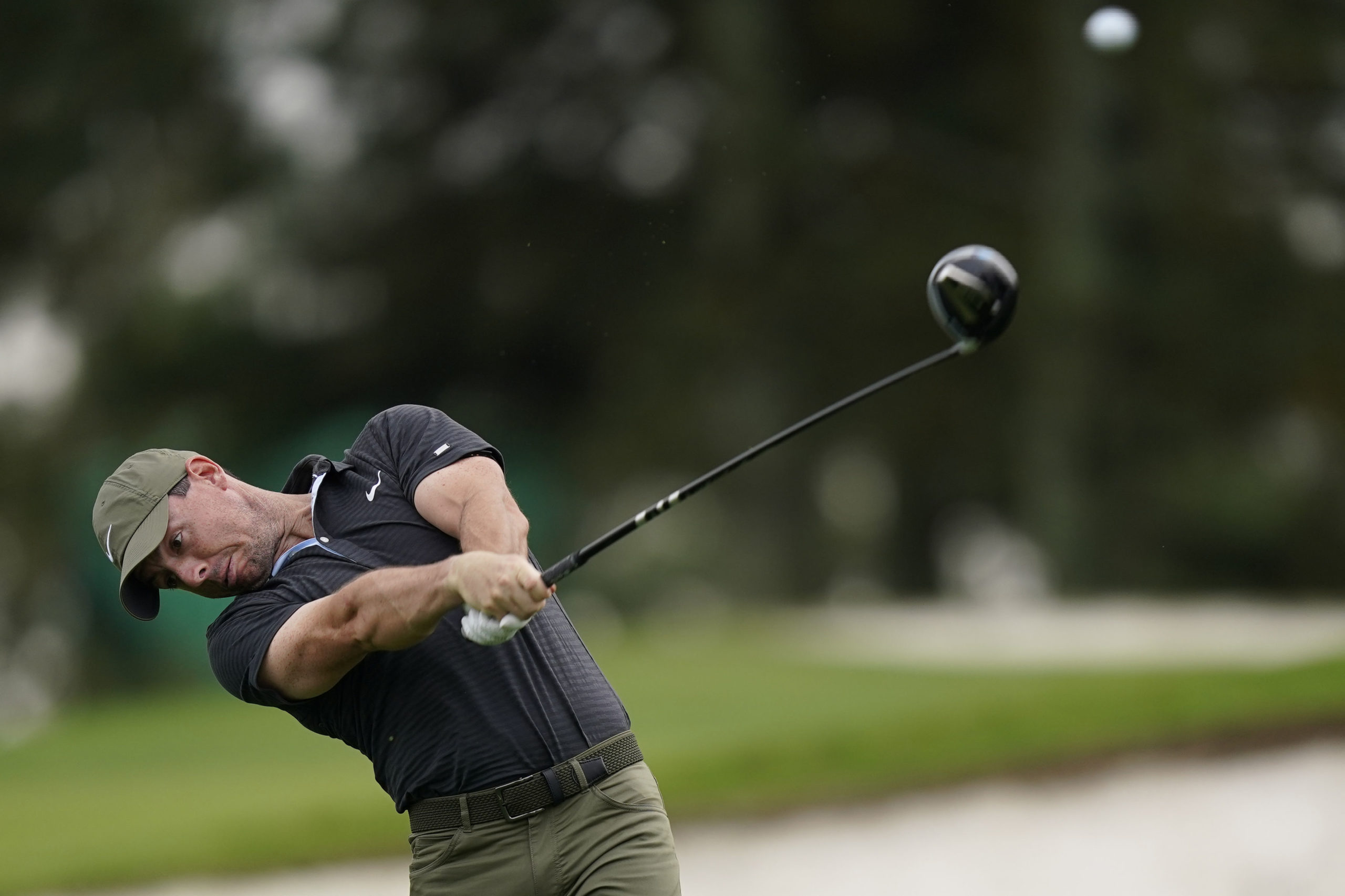 Rory McIlroy, of Northern Ireland, tees off on the third hole during a practice round for the Masters golf tournament Wednesday, Nov. 11, 2020, in Augusta, Ga.