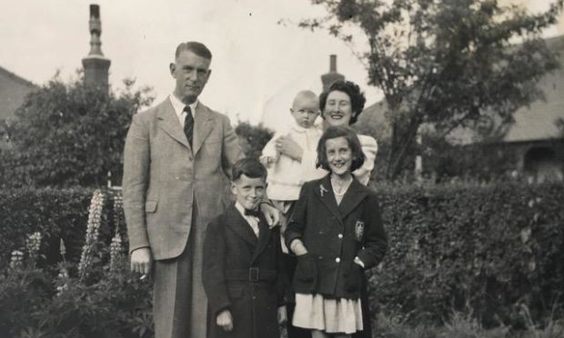 A Welsh library has uncovered a series of mystery photographs of the Walker family.
