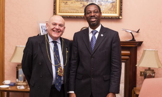 Project coordinator Olushola Ajide and Lord Provost Barney Crockett.