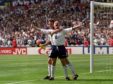 Paul Gascoigne celebrates with Teddy Sheringham in the Euro 96 clash against Scotland at Wembley.