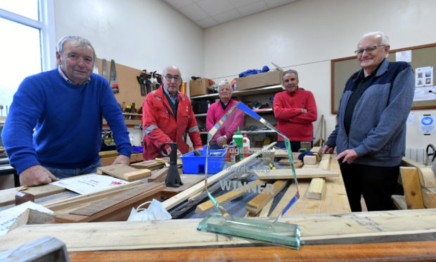 Stonehaven's Men's Shed are celebrating after winning an award in the Age Scotland  live awards ceremony 2020.
Pictured with the trophy are from left, Bill Allan the chairman, David Ross, Ian Smith, Duncan Cursiter a trustee and Douglas Knox the secretary.