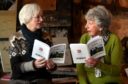 Director of Portsoy  Community Enterprise Anne McArthur, left  and Salmon Bothy volunteer Moira Smith with the new publication.