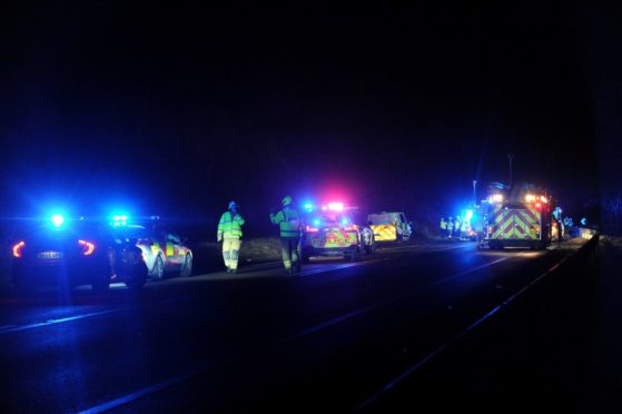 Emergency services at the scene of the road crash on the A96.
Picture by Darrell Benns