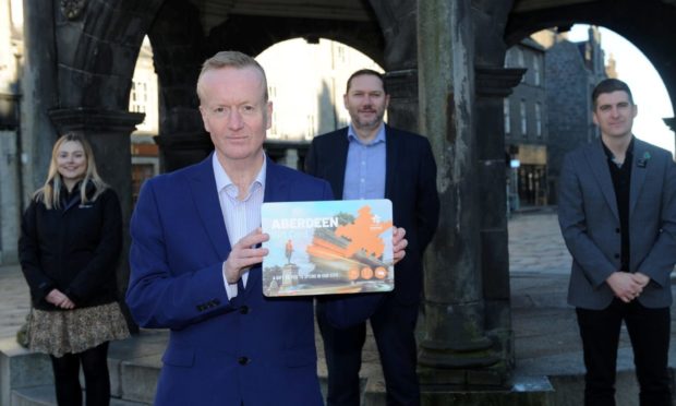 Pictured are from left, Emily Bishop (marketing manager of Bon Accord Centre), Aberdeen Inspired chief executive Adrian Watson, Douglas Lumsden (co-Llader of Aberdeen City Council) and Jamie Wishart (John Lewis) at the launch of the new Aberdeen Gift Card.