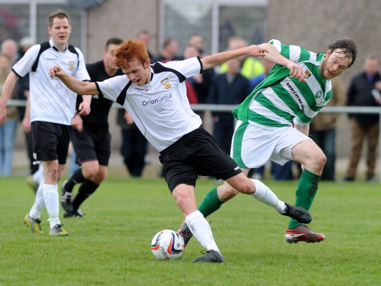 Martin Laing playing for Clach in 2014.