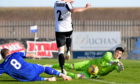 Lenny Wilson makes a save for Peterhead. 
Picture by Kath Flannery