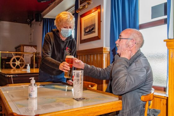Steamboat Inn owner Hazel Istance welcomes back Stevie Foster from Lossiemouth.