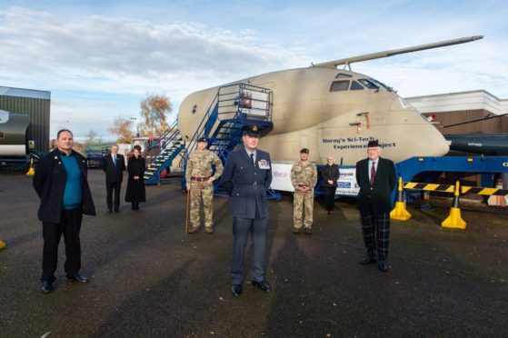 Mark Mair (Morayvia Chairman), Clr John Cowe and Joan Cowe Deputy LL of Moray) WO2 SSM Bruce Terris, Pete Surtees (Sqn Leader) Capt Shane Middleton, Lynne Herbert (director of Morayvia) and Seymour Monro LL of Moray mark the 40th anniversary of Kinloss aircraft crash.