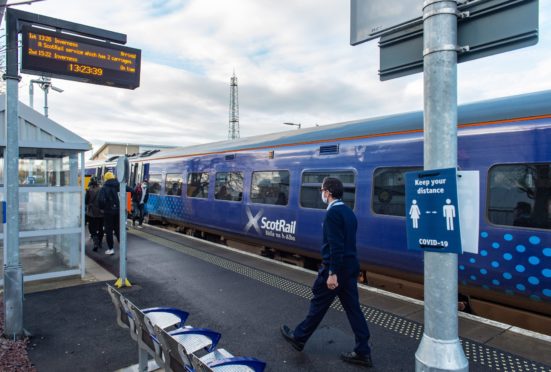 Train passengers in Elgin.