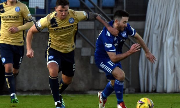 Forfar's Ross Meechan and Peterhead's Steven Boyd.
Picture by Kenny Elrick