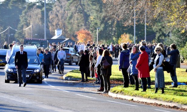 The cortege for the funeral of Corey Liversedge makes its way along Ballater Road in Aboyne.