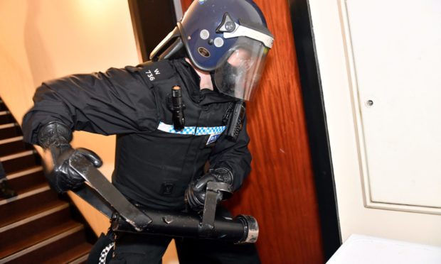 Police in Aberdeen during an early morning drugs raid.