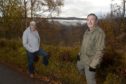Local concerns over another planned windfarm n the hills above Tomich and Glen Affric.   Objectors Peter Small and Angus Brumhead with the proposed site beyond. Picture by Sandy McCook