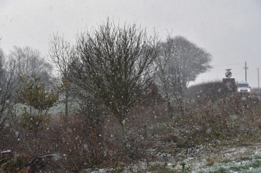 Snowfall on the Oldmeldrum Road near Whiterashes.