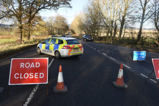 Police at the scene of the accident in Invergordon this morning.